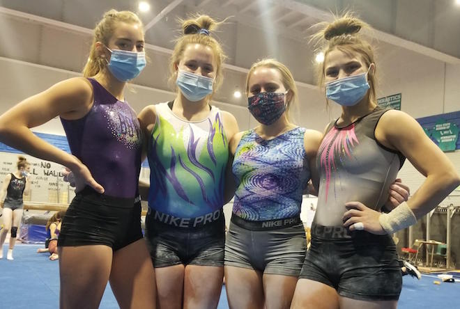 Near-perfect effort sends gymnasts to state