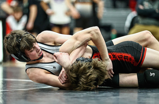 Wrestling: Demons claim regional title, advance 13 to sectionals
